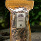 Bag of Reishi mushrooms with a label on a stone surface